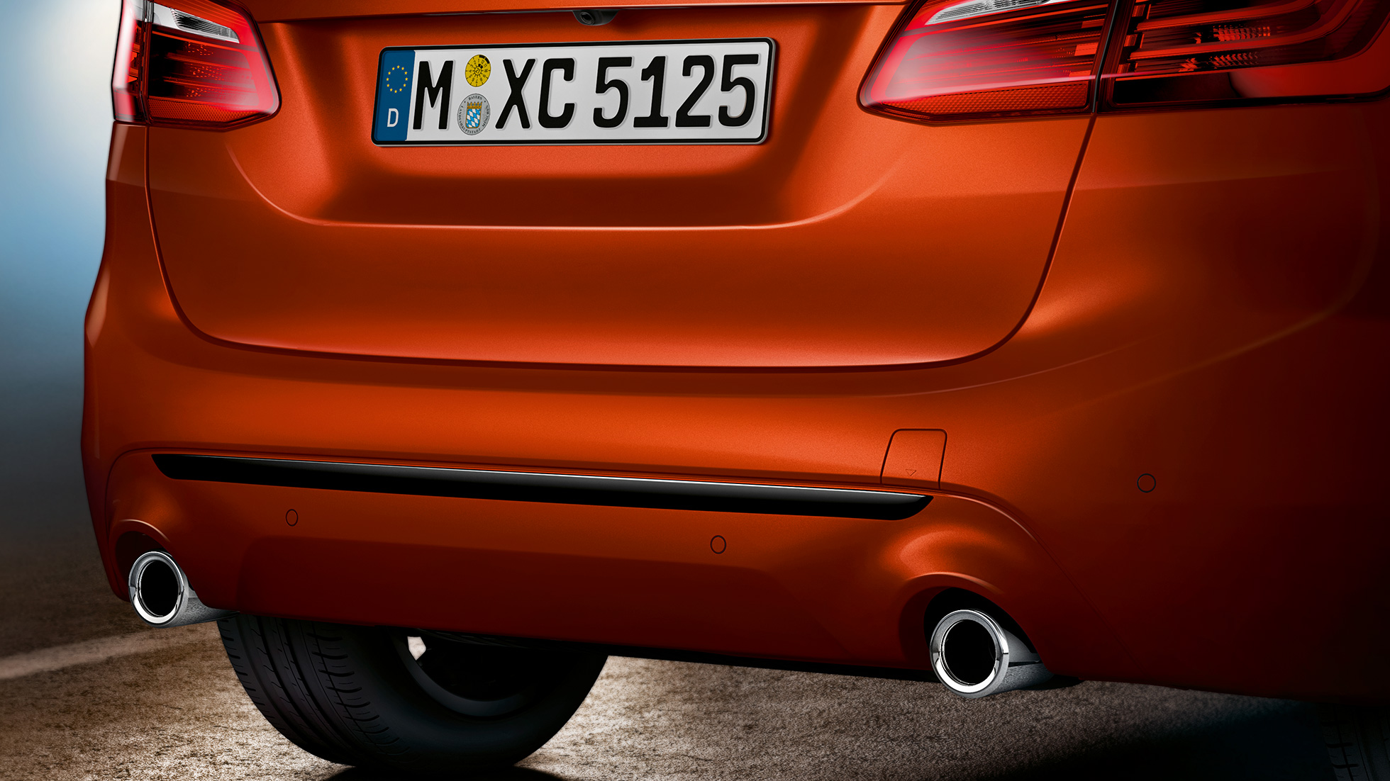 Rear section BMW 2 Series Active Tourer Rear section BMW 2 Series Active Tourer 220i F45 Facelift 2018 Sunset Orange metallic close-up rear