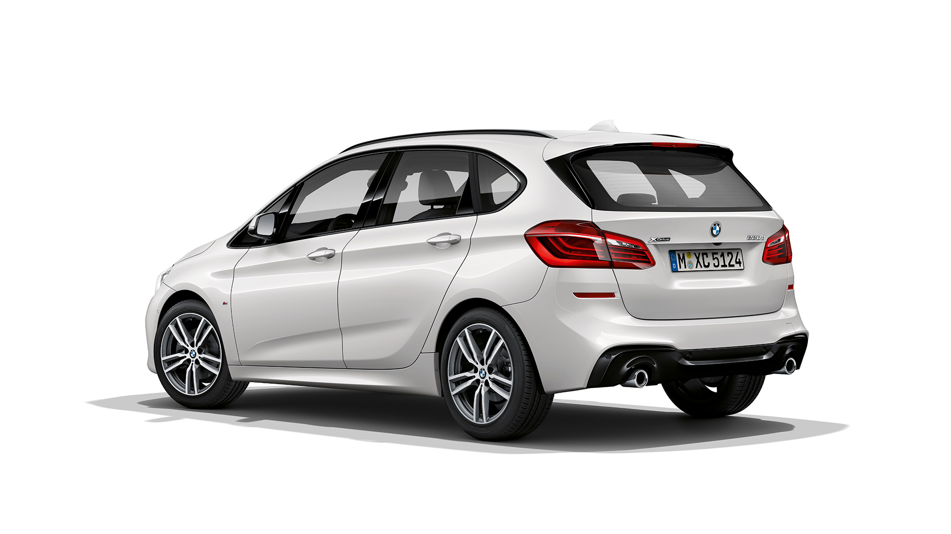 Three-quarter rear view BMW 2 Series Active Tourer Model M Sport BMW 2 Series Active Tourer in white 220d xDrive Model M Sport F45 2018 Mineral White metallic three-quarter rear view