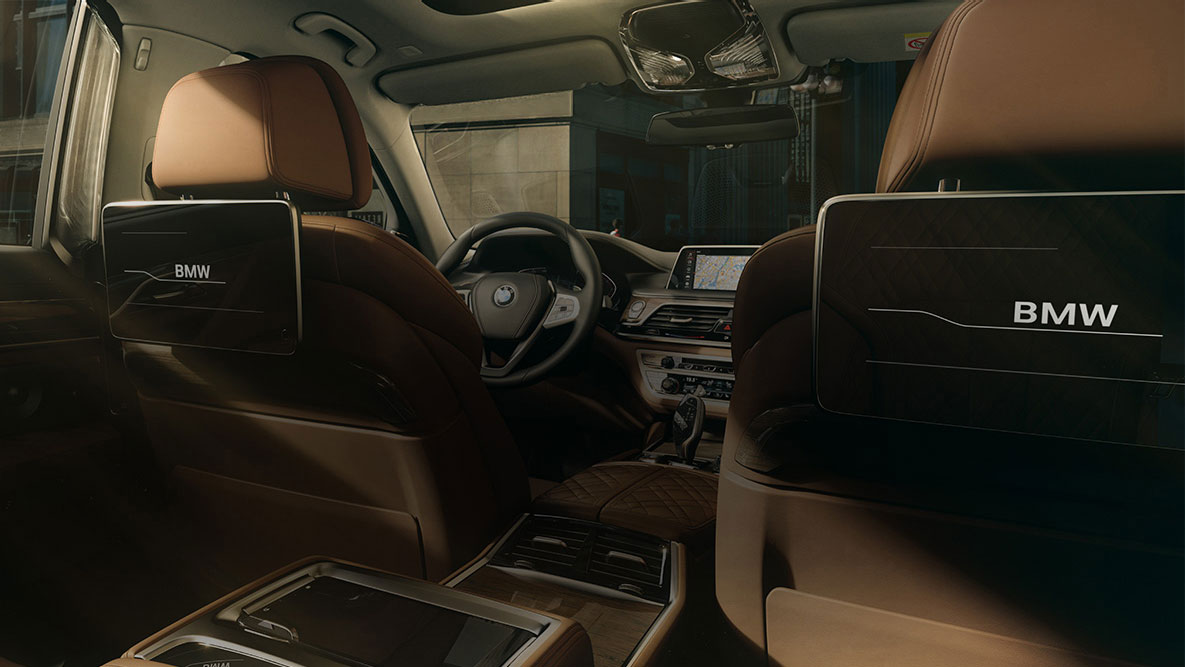 BMW 7 Series Sedan G11 G12 2019 Rear-seat Entertainment BMW 7 Series Sedan G11 G12 2019 view from behind to the Rear-seat Entertainment with HD Touch Screens