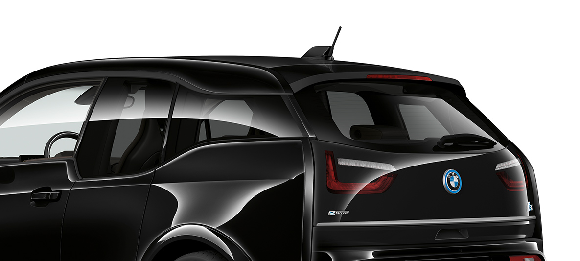 BMW i3s Edition RoadStyle 2019 three-quarter rear view BMW i3s Edition RoadStyle 2019 I01 Fluid Black with E-Copper highlights three-quarter rear view